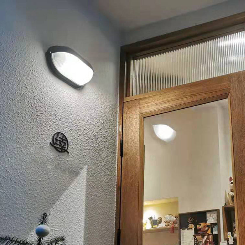 Applique murale extérieure en verre strié Nico – Ovale industrielle, noire ou verte