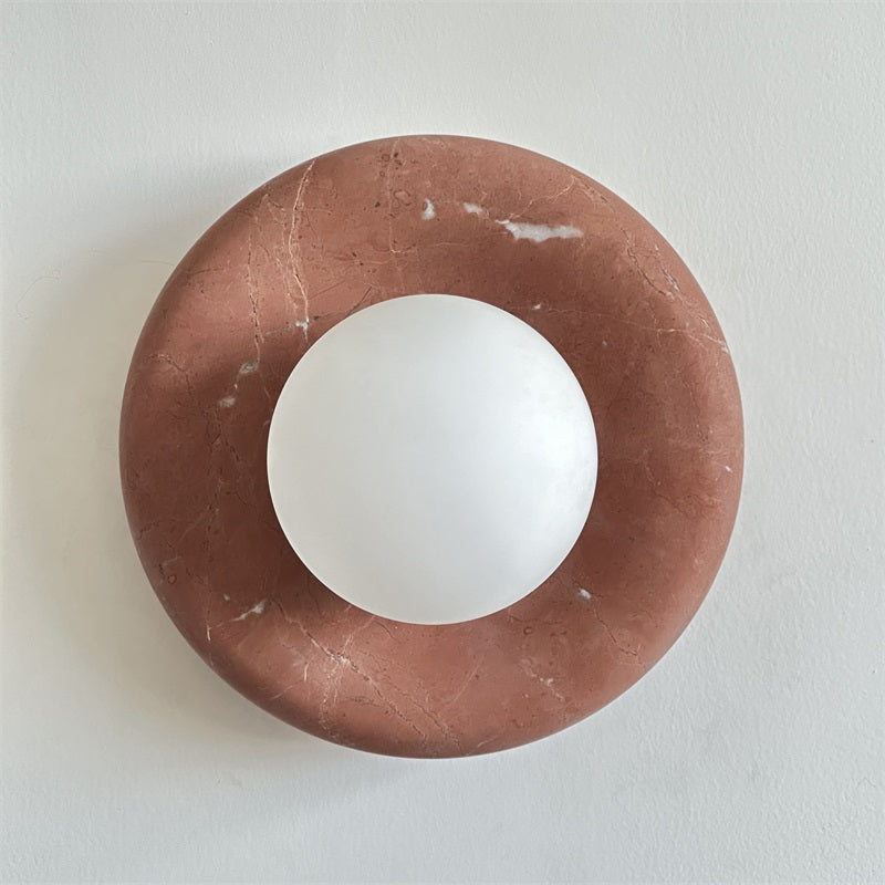 Applique murale en marbre Avi – Globe en verre sur platine de pierre arrondie