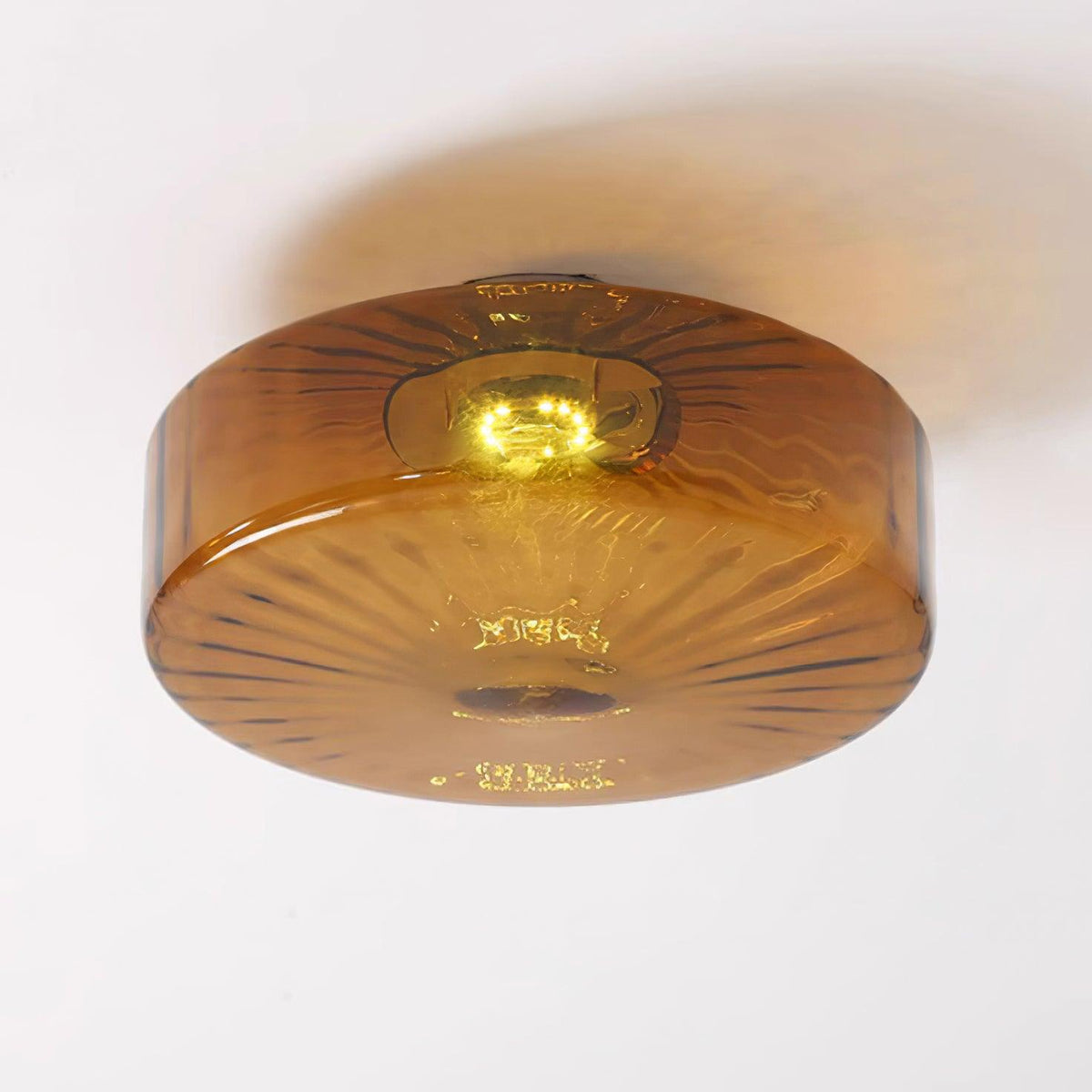 Plafonnier en verre ambré June – Motif rayonnant rétro, lumière chaude