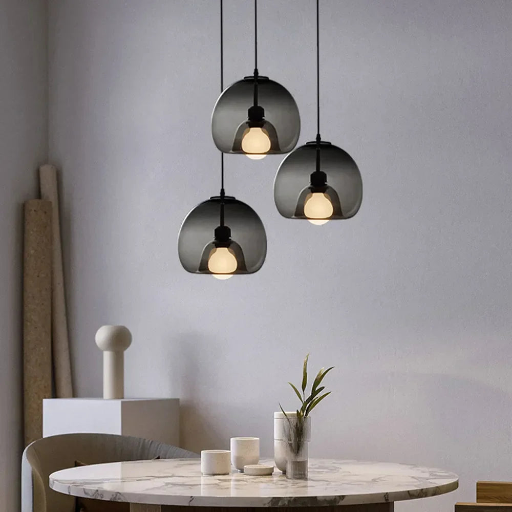 Suspension globe en verre June – Ambre, transparent ou gris fumé