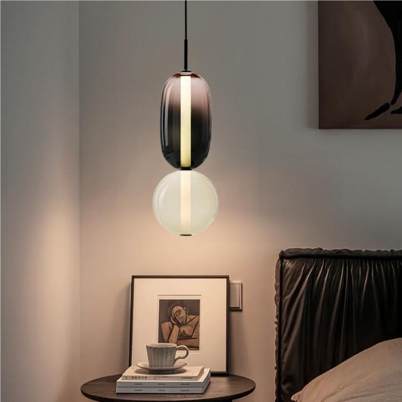 Suspension en verre ovale Syro – LED bicolore, dix combinaisons de couleurs